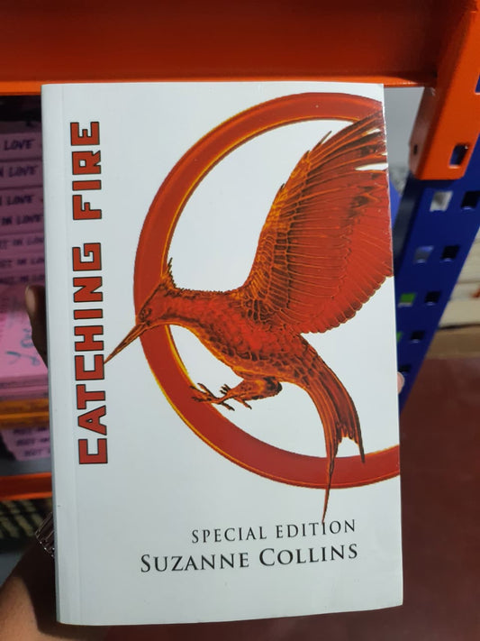 Catching Fire by Suzanne Collins (The Second Book of the Hunger Games)