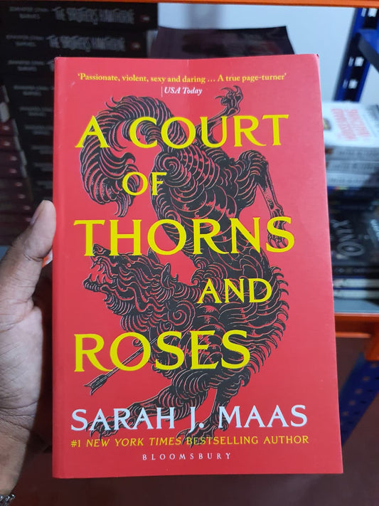A Court of Thorns and Roses by Sarah J. Maas (Book 1 of ACOTAR series)